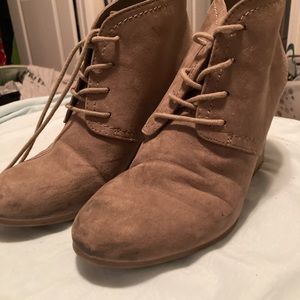 Heeled wedge booties
